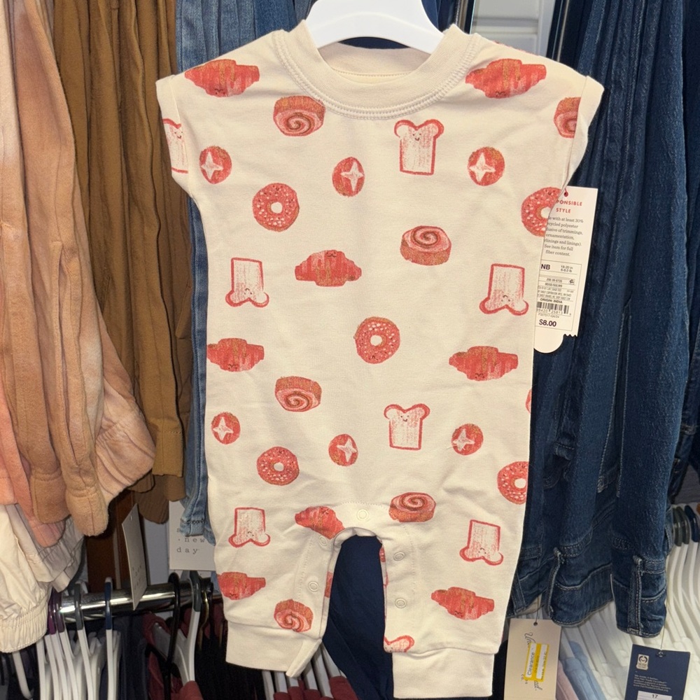 5/$10 New item… Cream Baby Romper with Red Pastry Print